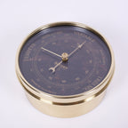 BAROMÈTRE EN PIERRE D'OBSIDIENNE<br>Ø12CM - COLLABORATION